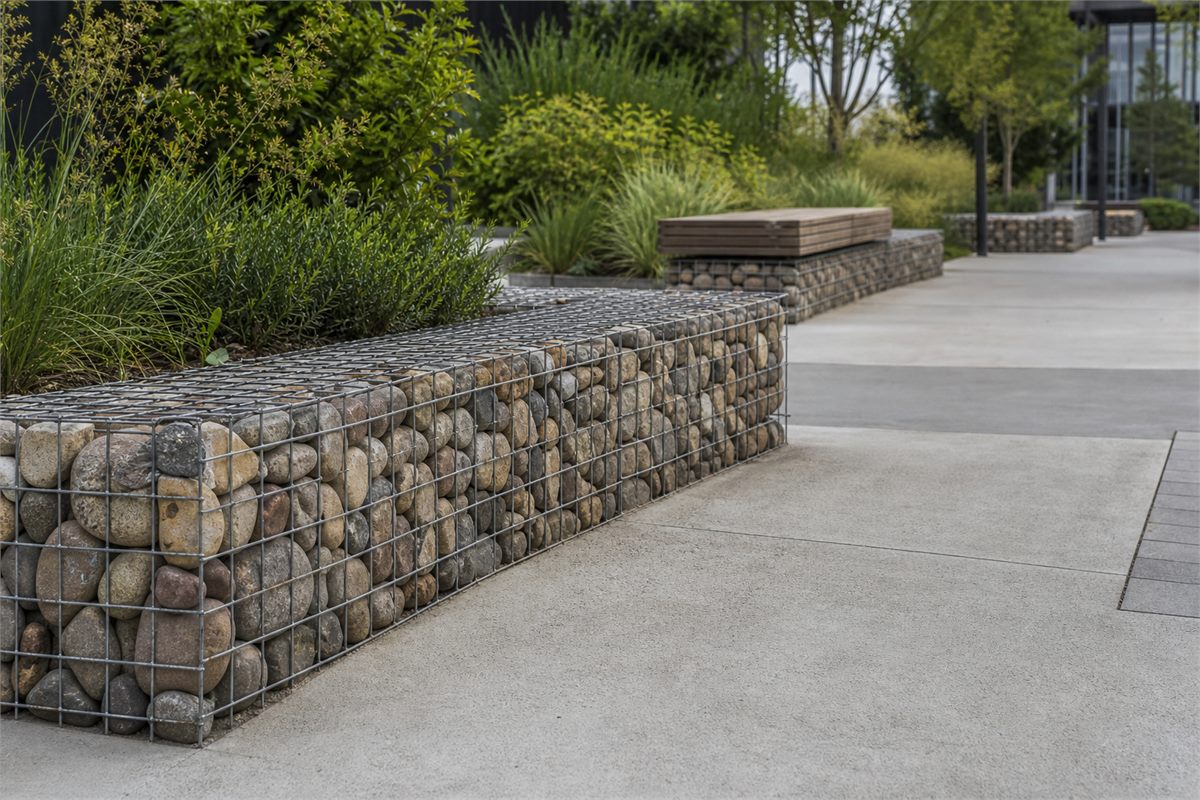 Landscape gabion basket wall with garden plants
